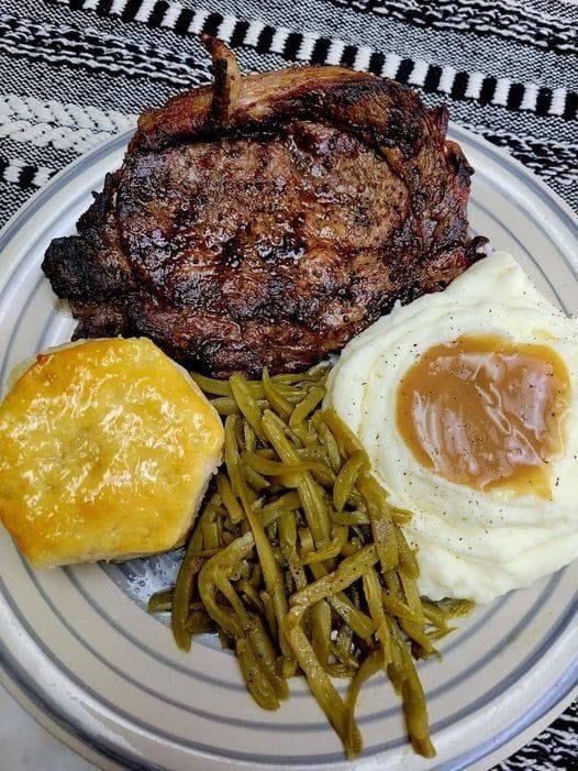 Here’s a complete meal recipe featuring **Grilled Steak**, **Mashed Potatoes with Gravy**, **French Cut Green Beans**, and **Honey Butter Biscuits**: