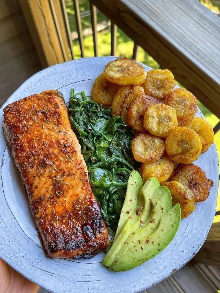  Pan-Seared Salmon with Plantains, Sautéed Spinach, and Avocado 