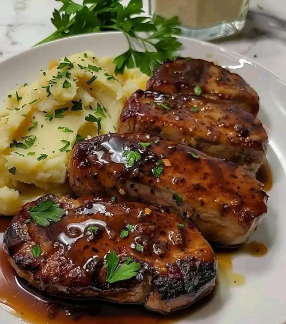 Salisbury steak with garlic mashed potatoes and mushroom & onion gravy